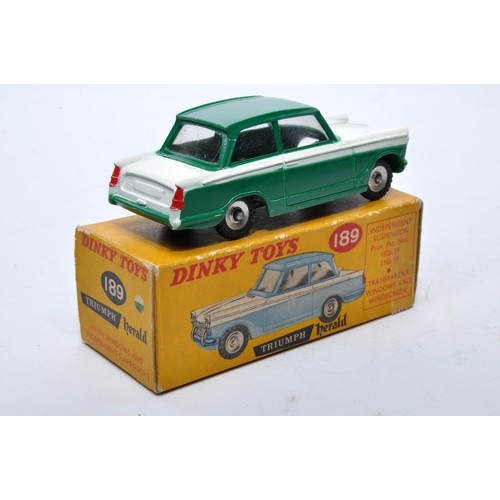 876 - Dinky No. 189 Triumph Herald. Single issue is in two-tone white and green, with chrome hubs, as show... 