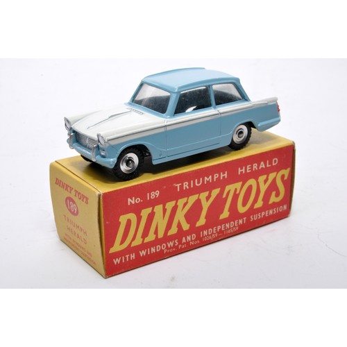 877 - Dinky No. 189 Triumph Herald. Single issue is in two-tone white and blue, with chrome hubs, as shown... 