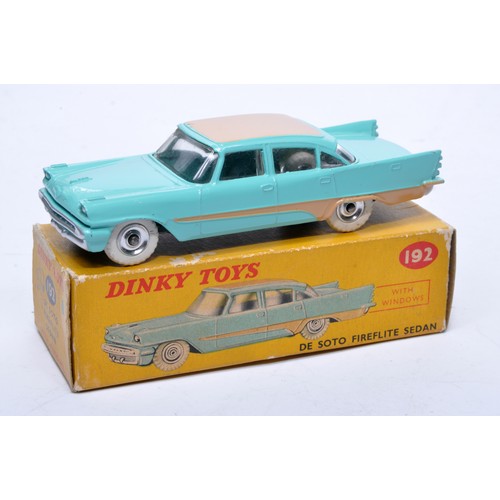 882 - Dinky No. 192 De Soto Fireflite Sedan. Single issue is in two-tone green and pink, with chrome hubs,... 