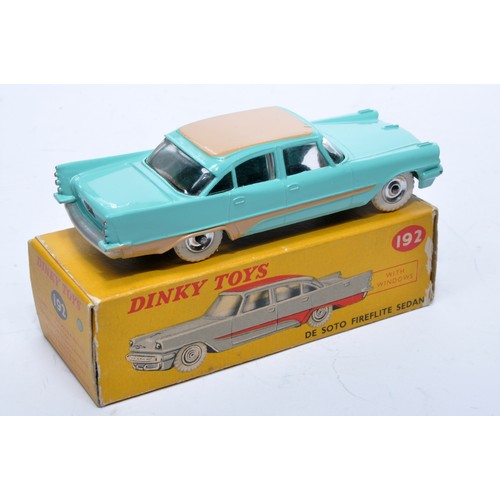 882 - Dinky No. 192 De Soto Fireflite Sedan. Single issue is in two-tone green and pink, with chrome hubs,... 