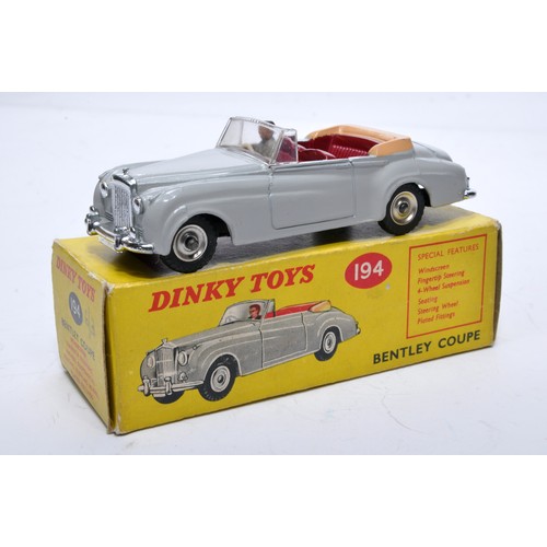 884 - Dinky No. 194 Bentley Coupe. Single issue is in grey with maroon interior, with chrome hubs, as show... 