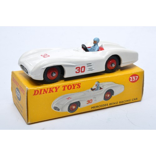 891 - Dinky No. 237 Mercedes Benz Racing Car. Single issue is in white, RN30, with red hubs, as shown. Dis... 