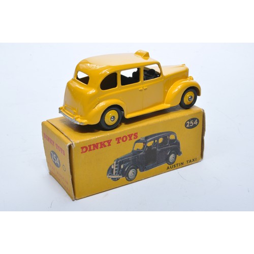 899 - Dinky No. 254 Austin Taxi. Single issue is in yellow, with yellow hubs, as shown. Displays generally... 