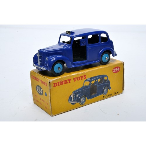 901 - Dinky No. 254 Austin Taxi. Single issue is in petrol blue, with blue hubs, as shown. Displays genera... 