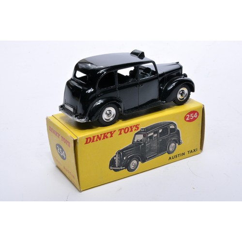 903 - Dinky No. 254 Austin Taxi. Single issue is in black, with chrome, as shown. Displays generally very ... 