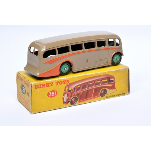 914 - Dinky No. 281 Luxury Coach. Single issue is in dark fawn, with orange flashes, and green hubs. Displ... 