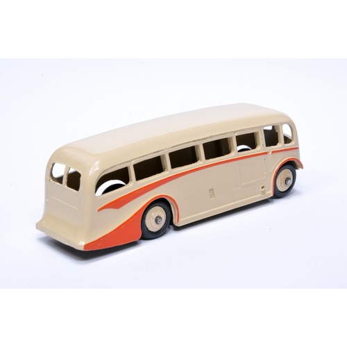 916 - Dinky No. 281 Luxury Coach. Single issue is in light beige, with orange flashes, and beige hubs. Dis... 