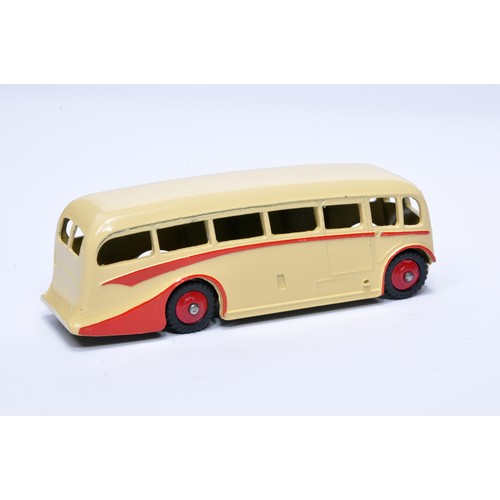 917 - Dinky No. 281 Luxury Coach. Single issue is in dark cream / beige, with red flashes, and red hubs. D... 