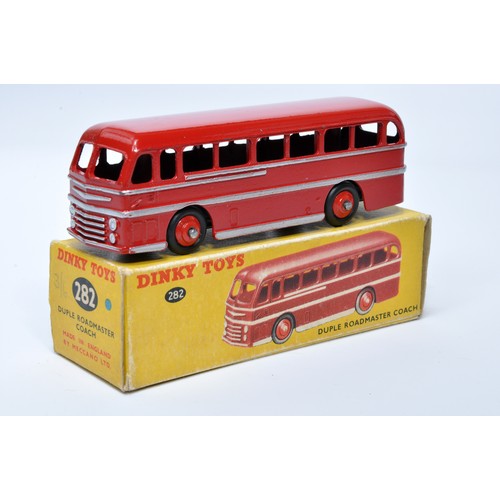 919 - Dinky No. 282 Duple Roadmaster Coach. Single issue is in red, with silver trim, and red hubs. Displa... 