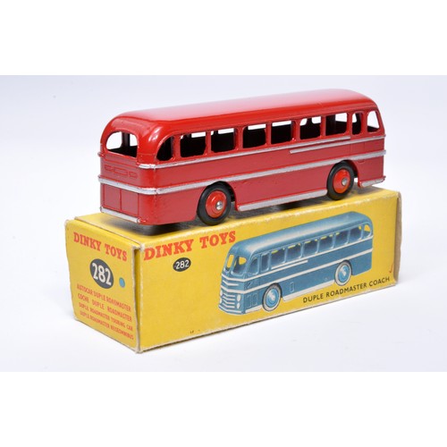 919 - Dinky No. 282 Duple Roadmaster Coach. Single issue is in red, with silver trim, and red hubs. Displa... 