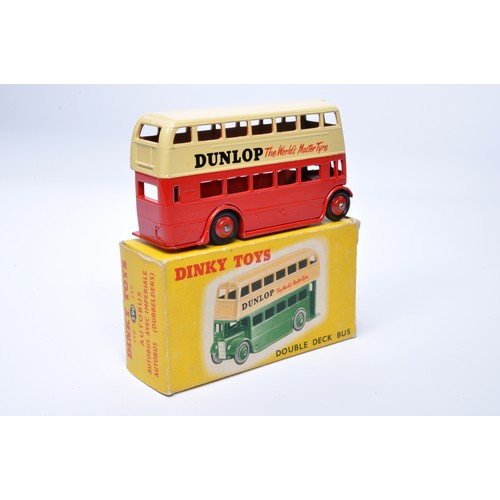 925 - Dinky No. 290 Double Deck Bus. Single issue is in two-tone cream and red, with 'Dunlop' livery, and ... 