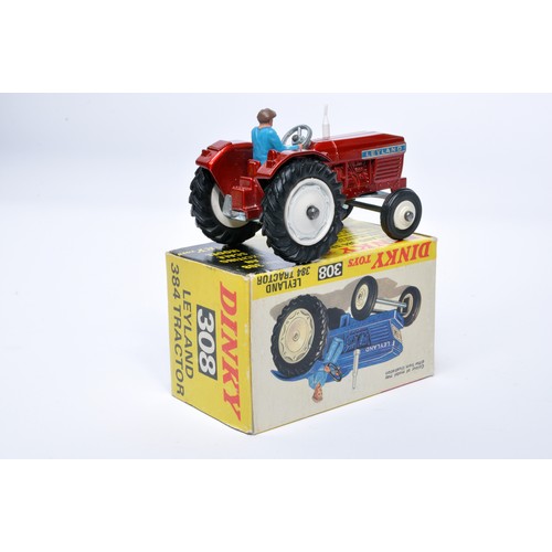 932 - Dinky No. 308 Leyland 384 Tractor. Single issue is in red, with white hubs, as shown. Displays gener... 