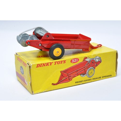 934 - Dinky No. 321 Massey Harris Manure Spreader. Single issue is in red, with yellow plastic hubs, plus ... 