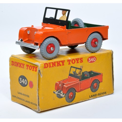 935 - Dinky No. 340 Land Rover. Single issue is in orange, with green interior, and red ridged hubs, as sh... 