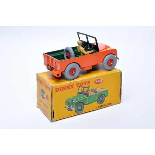 935 - Dinky No. 340 Land Rover. Single issue is in orange, with green interior, and red ridged hubs, as sh... 