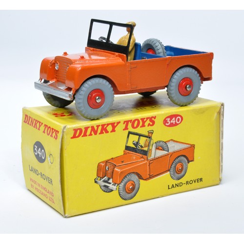 936 - Dinky No. 340 Land Rover. Single issue is in orange, with blue interior, and red ridged hubs, as sho... 