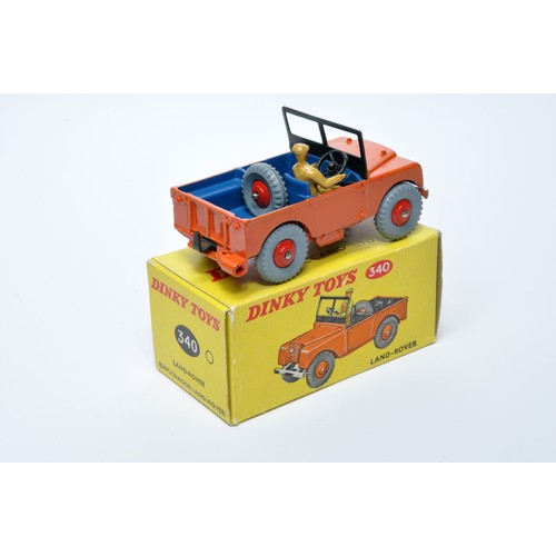 936 - Dinky No. 340 Land Rover. Single issue is in orange, with blue interior, and red ridged hubs, as sho... 