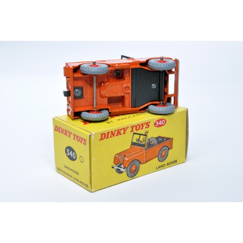 936 - Dinky No. 340 Land Rover. Single issue is in orange, with blue interior, and red ridged hubs, as sho... 