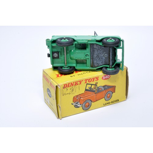 940 - Dinky No. 340 Land Rover. Single issue is in green, with tan interior, and green ridged hubs, as sho... 