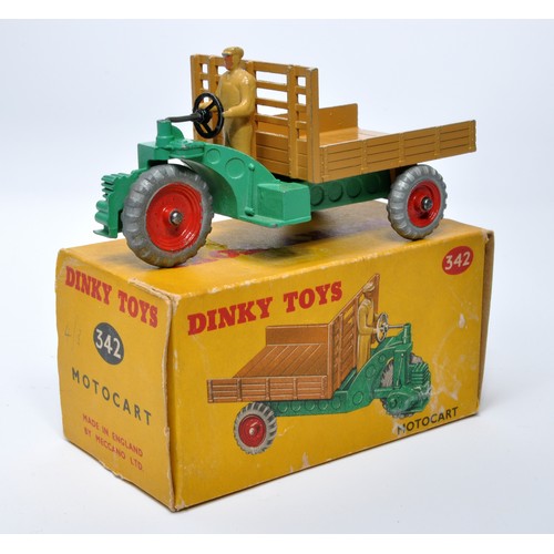 944 - Dinky No. 342 Motocart. Single issue is in tan and green, with red metal hubs, as shown. Displays ge... 