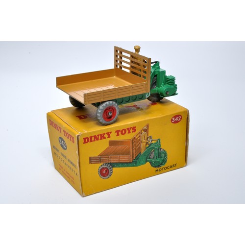 944 - Dinky No. 342 Motocart. Single issue is in tan and green, with red metal hubs, as shown. Displays ge... 