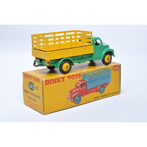 945 - Dinky No. 343 Farm produce wagon. Single issue is in green with yellow back, plus yellow hubs, as sh... 