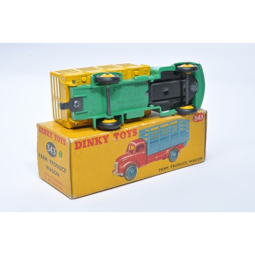 945 - Dinky No. 343 Farm produce wagon. Single issue is in green with yellow back, plus yellow hubs, as sh... 