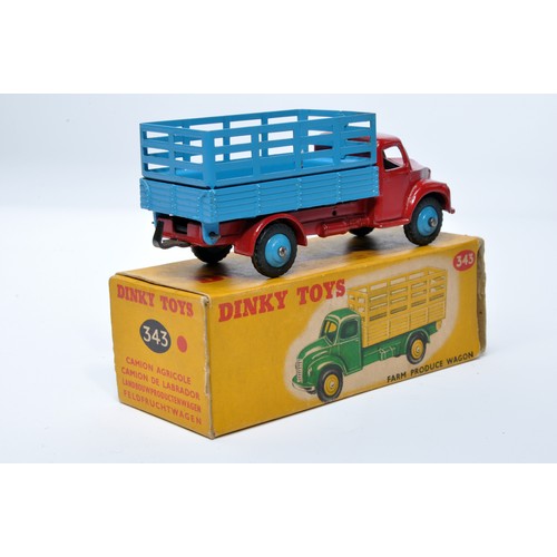 946 - Dinky No. 343 Farm produce wagon. Single issue is in red with blue back, plus blue hubs, as shown. D... 