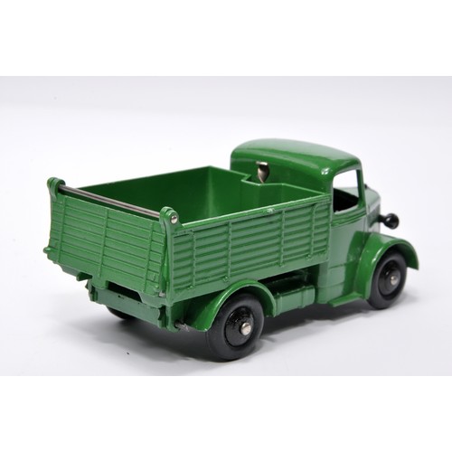 950 - Dinky No. 25m / 410 Bedford End Tipper. Single issue is in dark green, with black hubs, as shown. Di... 