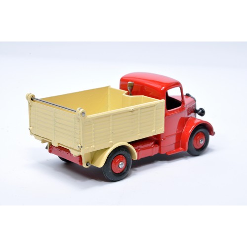 952 - Dinky No. 25m / 410 Bedford End Tipper. Single issue is in red / cream, with red hubs, as shown. Dis... 