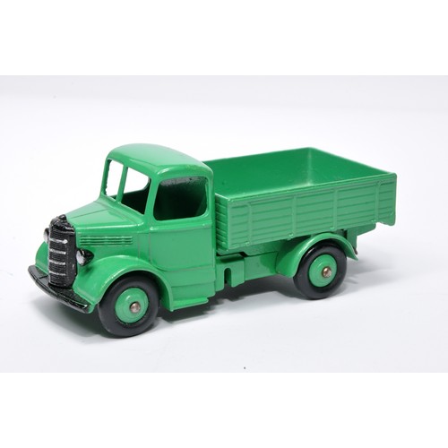 958 - Dinky No. 411 Bedford truck. Single issue is in green with green hubs, as shown. Displays generally ... 