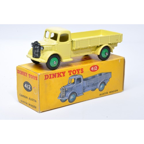 961 - Dinky No. 412 Austin Open Back Wagon. Single issue is in lemon yellow with mid-green hubs, as shown.... 