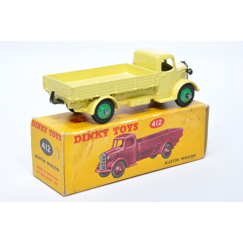 961 - Dinky No. 412 Austin Open Back Wagon. Single issue is in lemon yellow with mid-green hubs, as shown.... 