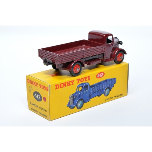 964 - Dinky No. 412 Austin Open Back Wagon. Single issue is in maroon with red hubs, as shown. Displays ge... 