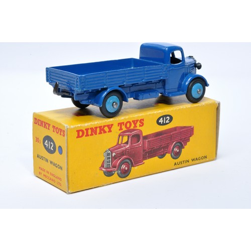 966 - Dinky No. 412 Austin Open Back Wagon. Single issue is in blue with mid-blue hubs, as shown. Displays... 