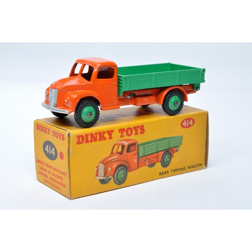 974 - Dinky No. 414 Austin Rear Tipping Wagon. Single issue is in orange / green with green hubs, and trea... 