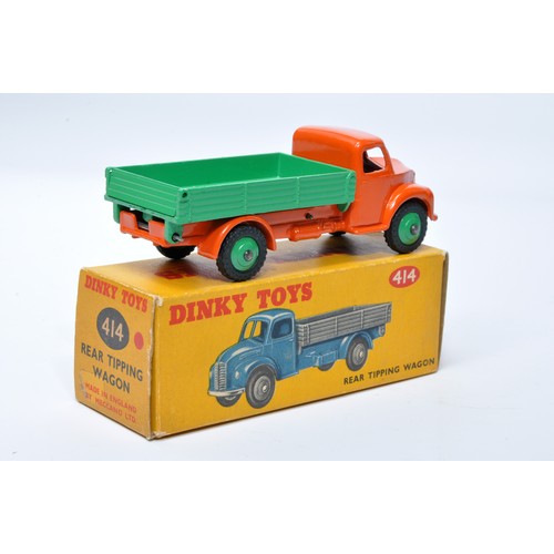 974 - Dinky No. 414 Austin Rear Tipping Wagon. Single issue is in orange / green with green hubs, and trea... 