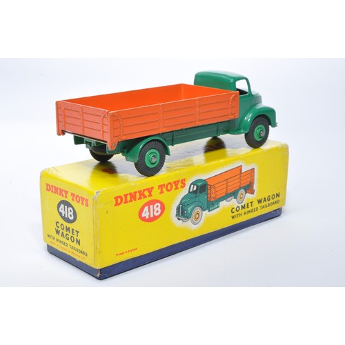 978 - Dinky No. 418 Leyland Comet Wagon with hinged tailboard. Single issue is in dark green with orange b... 