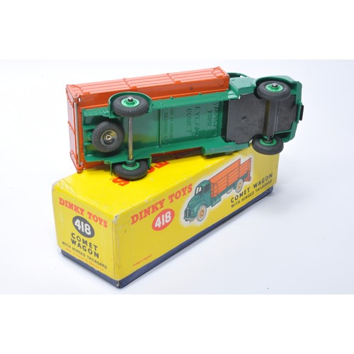 978 - Dinky No. 418 Leyland Comet Wagon with hinged tailboard. Single issue is in dark green with orange b... 