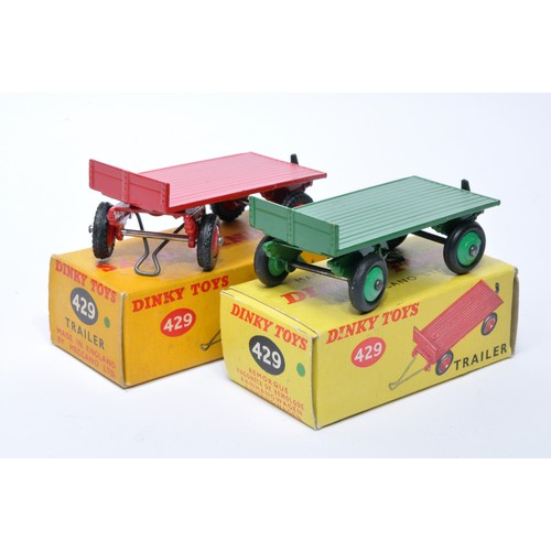 990 - Dinky No. 429 Trailer. Duo of issues are in red and green, as shown, red has treaded tyres. Display ... 