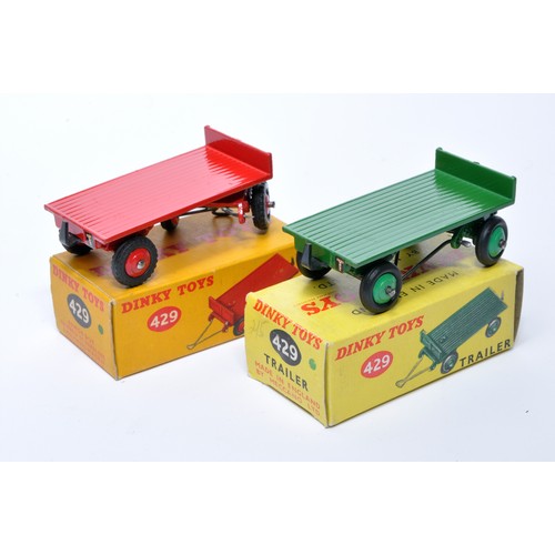 990 - Dinky No. 429 Trailer. Duo of issues are in red and green, as shown, red has treaded tyres. Display ... 