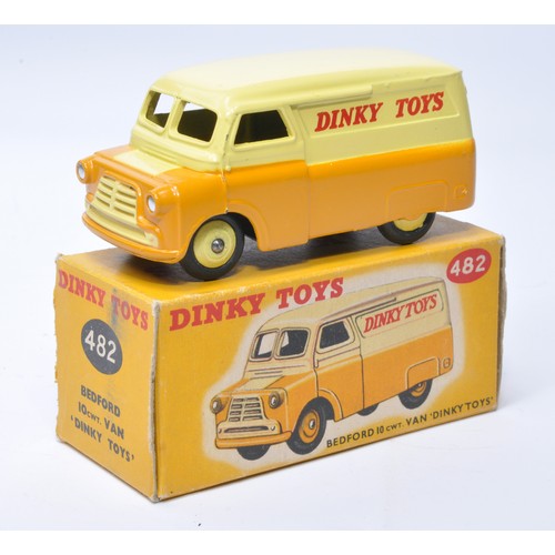 1011 - Dinky No. 482 Bedford Van, Dinky Toys. Single issue is in two-tone tan and yellow, with yellow hubs,... 