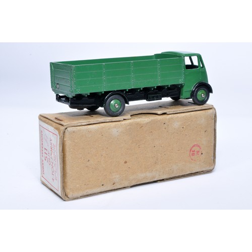 1026 - Dinky No. 511 Guy 4-Ton Lorry. Single issue is in green and black, with green hubs, as shown. Displa... 