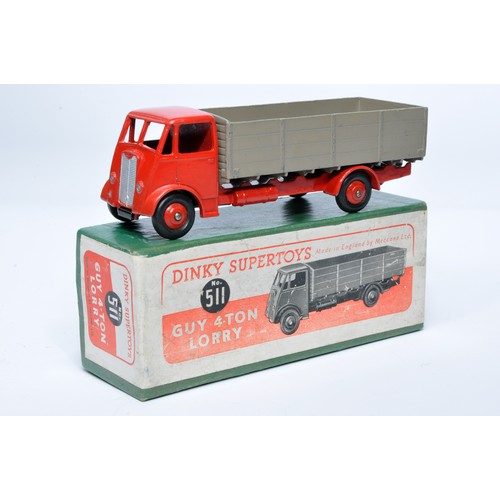 1027 - Dinky No. 511 Guy 4-Ton Lorry. Single issue is in red and fawn (cab and chassis), with red hubs, as ... 