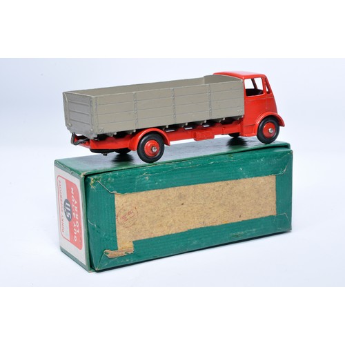 1027 - Dinky No. 511 Guy 4-Ton Lorry. Single issue is in red and fawn (cab and chassis), with red hubs, as ... 