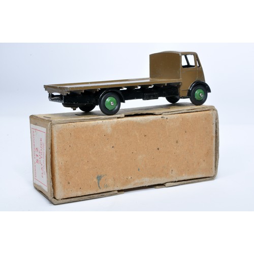 1029 - Dinky No. 512 Guy flat truck. Single issue is in khaki brown, with green hubs, as shown. Displays ge... 