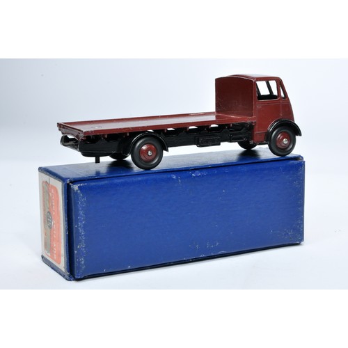 1031 - Dinky No. 512 Guy flat truck. Single issue is in maroon, with maroon hubs, as shown. Displays genera... 