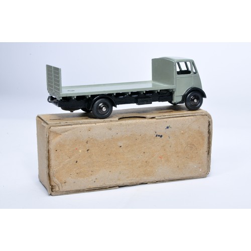 1033 - Dinky No. 513 Guy flat truck with tailboard. Single issue is in grey / black, with grey hubs, as sho... 