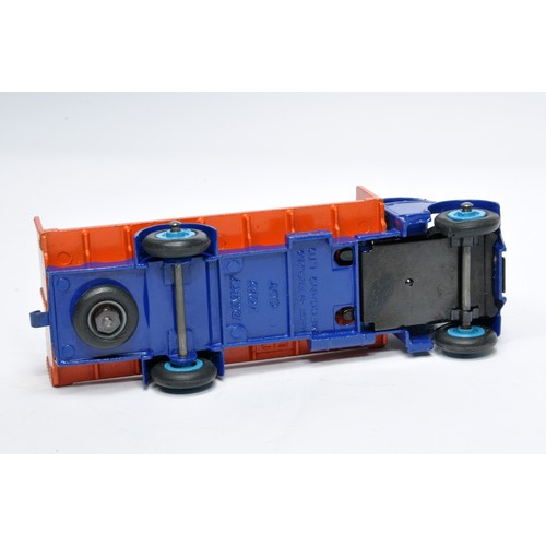 1036 - Dinky No. 513 Guy flat truck with tailboard. Single issue is in blue and orange, with mid-blue hubs,... 