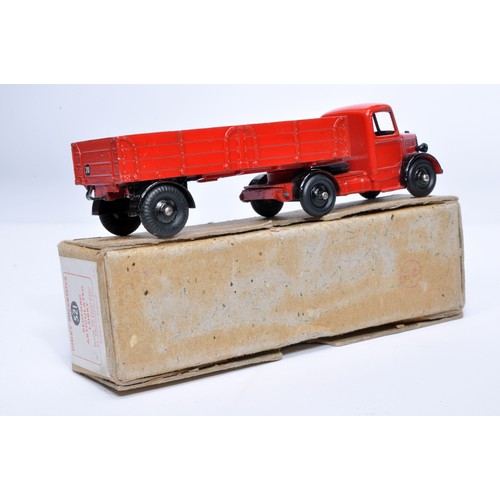 1038 - Dinky No. 521 Bedford Articulated Lorry. Single issue is in red / black, with black hubs, as shown. ... 